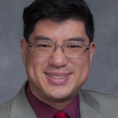Official photo of Tackey Chan